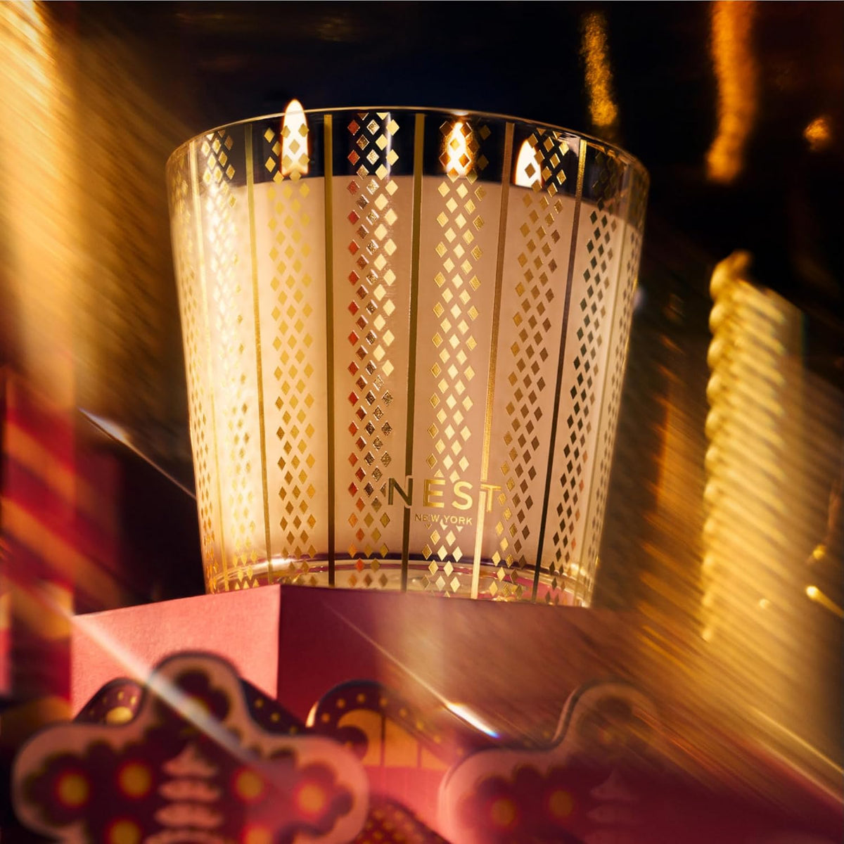 NEST Holiday 3-Wick Candle lit